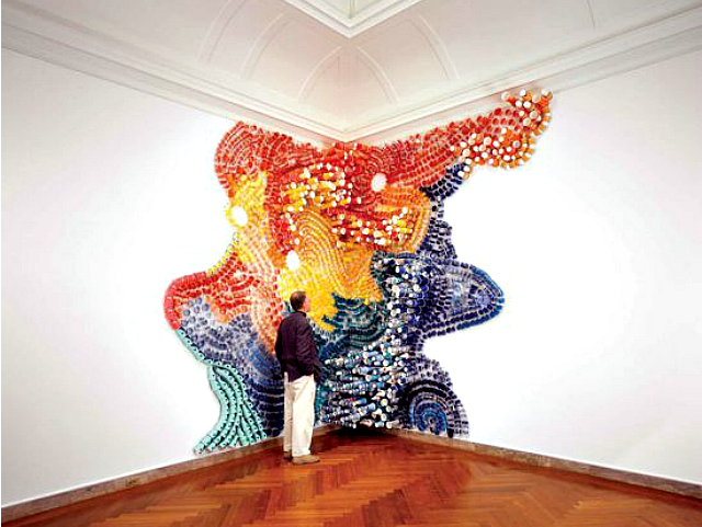 Mesmerizing Wall Collages Made Of Paper And Plastic Cups throughout