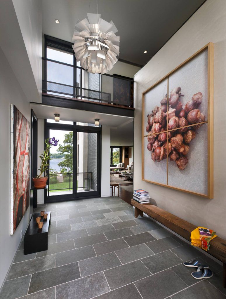 15 Modern Foyer Designs To Welcome You Home intended for The Art of the Entryway Curating Ambiance Through Wall Finishes