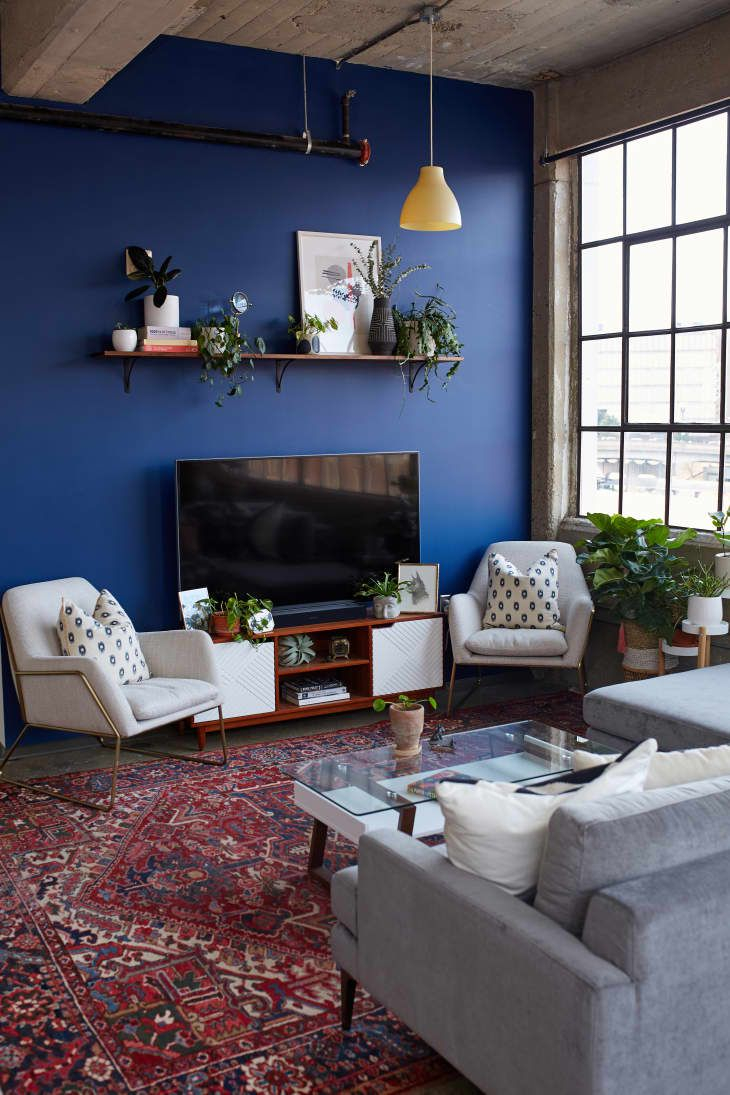 A Bold Blue Accent Wall Is Just One Of The Beautiful Things About This ... intended for The Living Room Transformed A Family's Bold Vertical Adventure