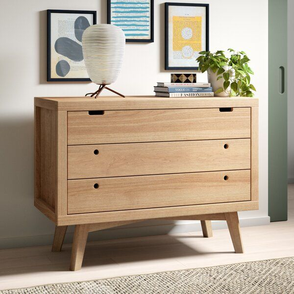 A Wooden Dresser With Drawers And Pictures On The Wall pertaining to Discovering New Uses for Your Cresco 3 Drawer Dresser