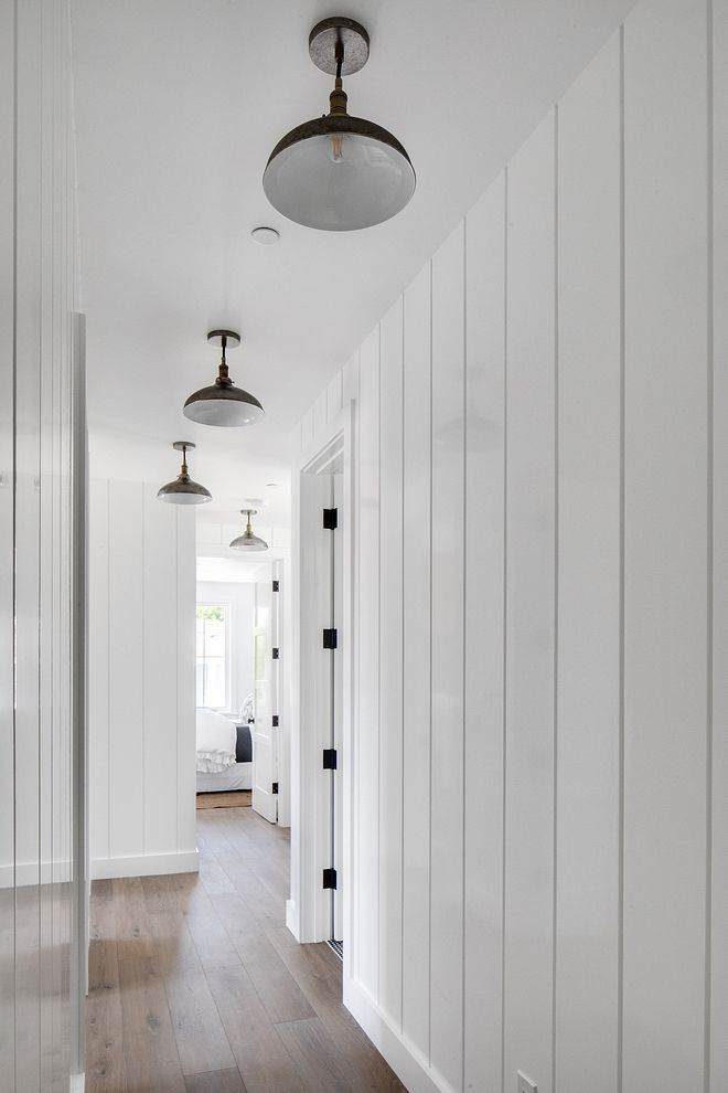 Tongue And Groove Paneling And Barnhouse Lighting | White Wall Paneling ... in The Secret to Taller Rooms Vertical Tongue and Groove Paneling Explained