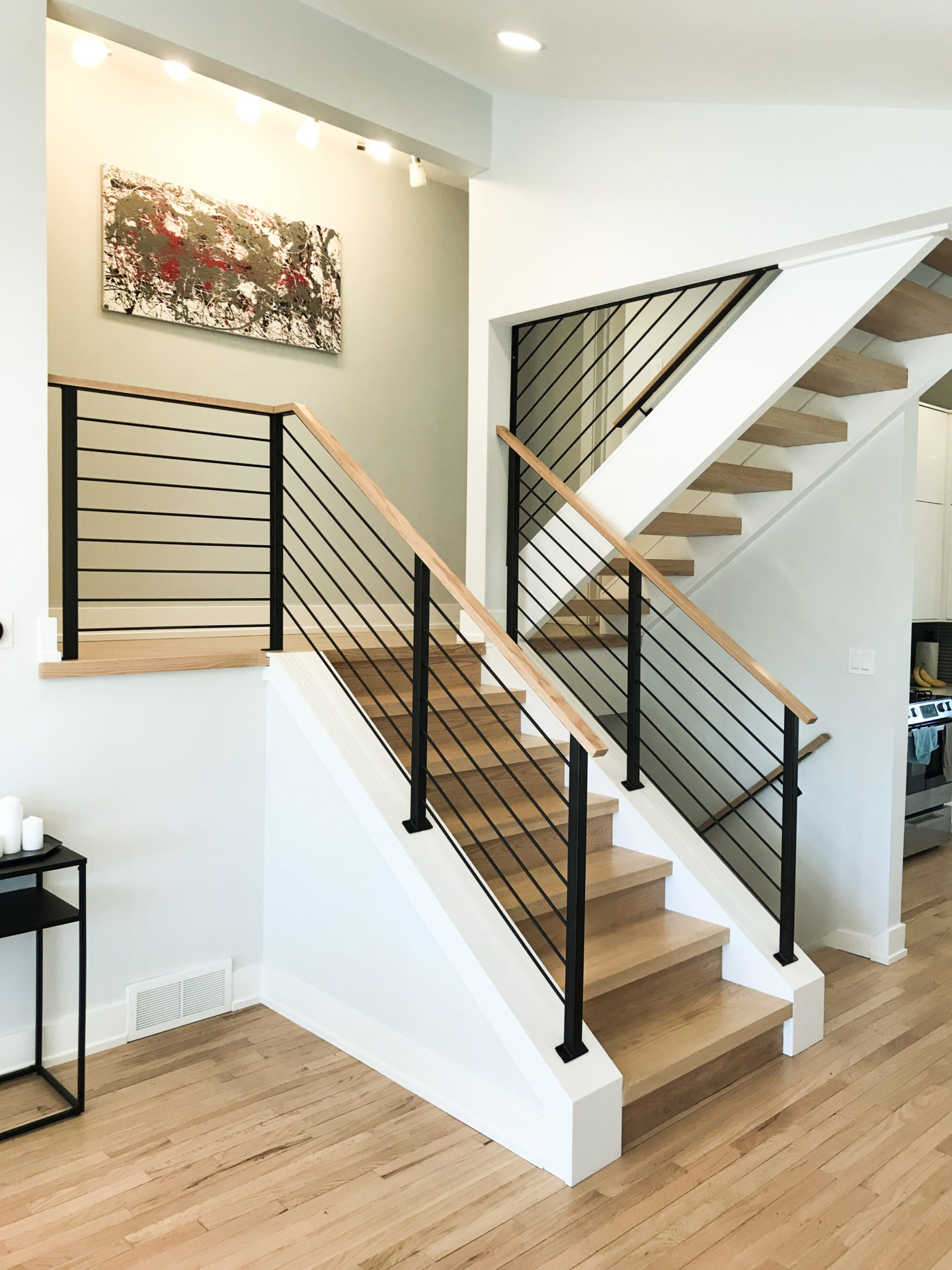 Staircase Steel Bar Design At Albert Avila Blog with Designing Around the Page Brown Wood and Black Metal Staircase Shelving Unit