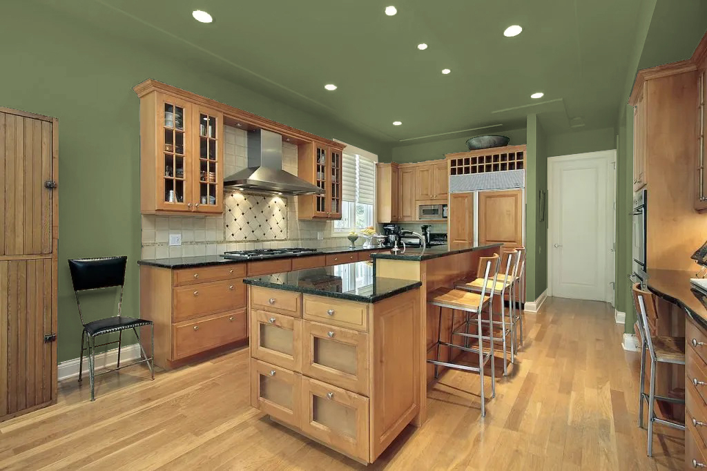 22 Striking Wall Colors To Make Your Oak Kitchen Cabinets Pop ... for A Fresh Perspective Green Walls as a Stunning Kitchen Feature