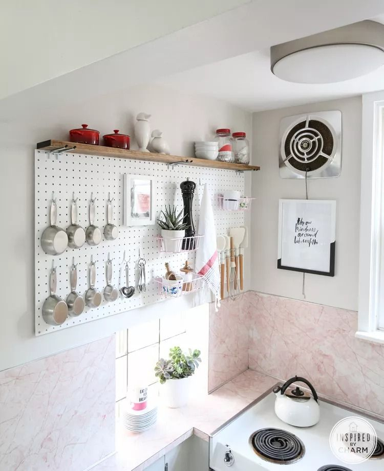 25 Brilliant Pegboard Ideas That Will Help You See Your Walls ... in Boost Your Kitchen Storage With Pegboard On A Wall