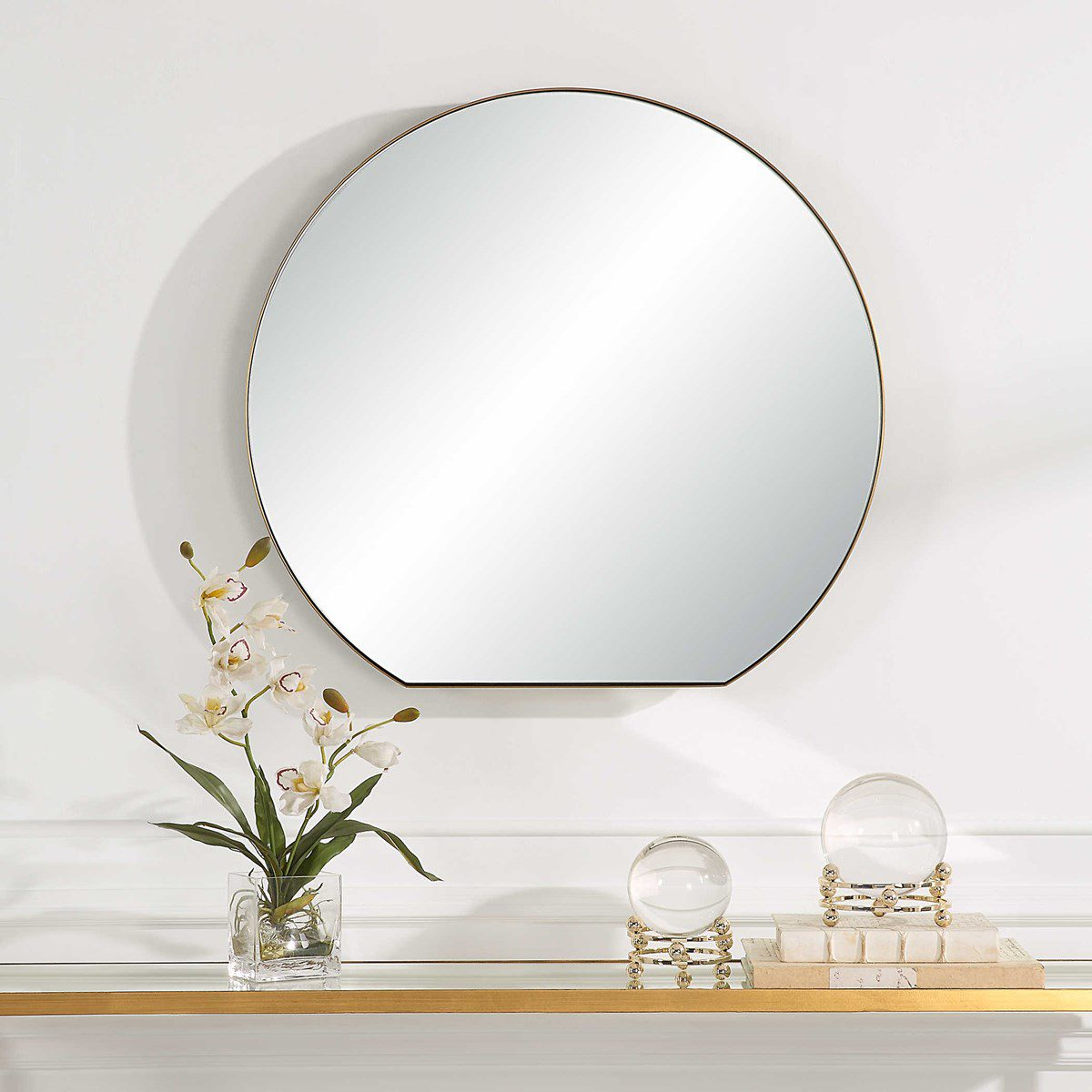 Uttermost Cabell Small Brass Mirror | The Gilded Thistle in A Deep Dive into the Craftsmanship of the Uttermost Cabell Brass Oval Mirror