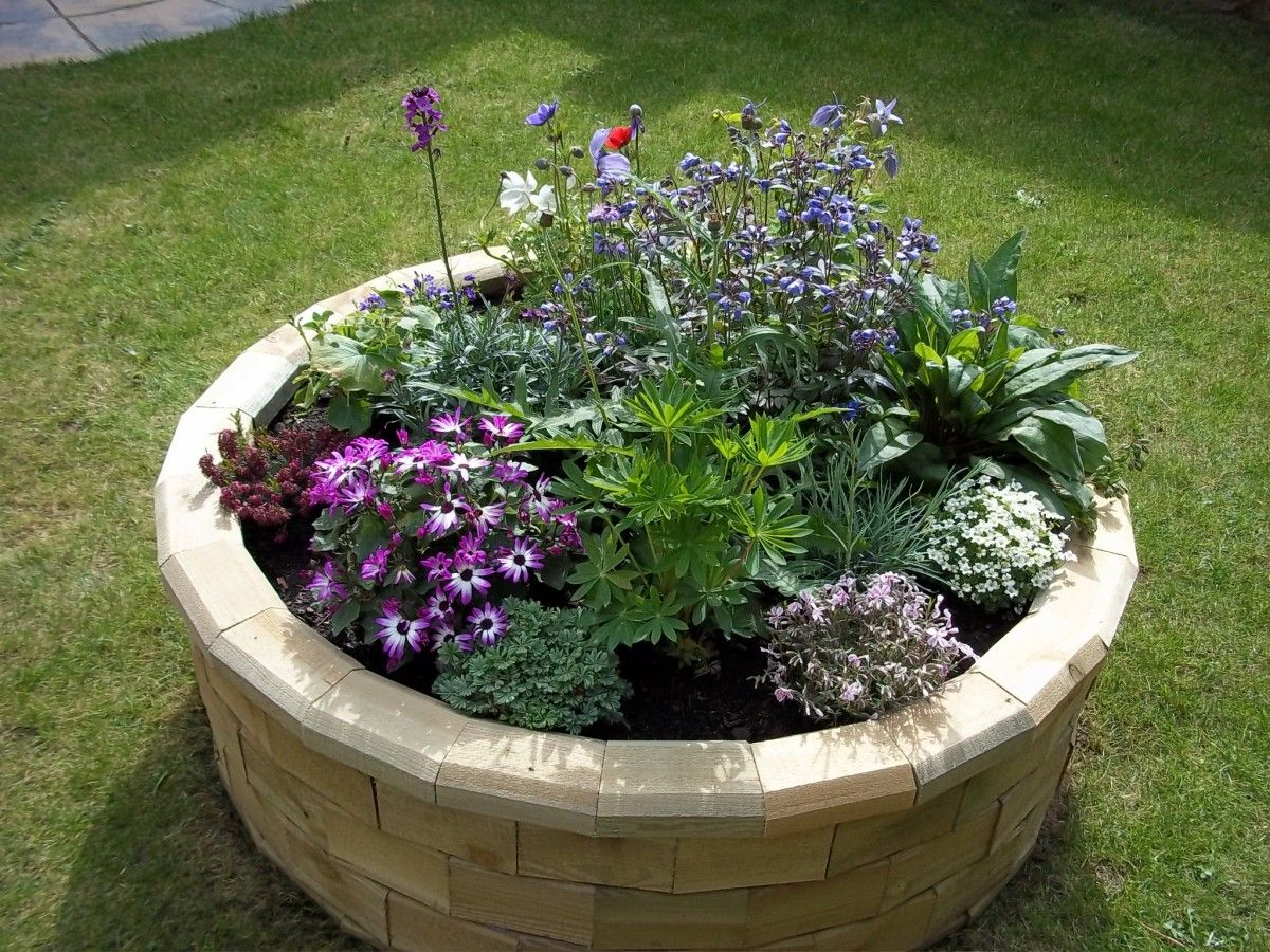 21 Circular Raised Garden Bed Ideas You Cannot Miss | Sharonsable within Building circular raised beds with recycled fire rings and stone