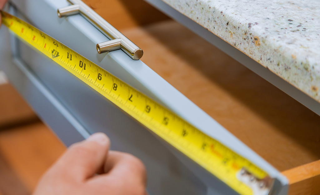 How To Install Cabinet Handles - The Home Depot for How To Measure Cabinet Handles For Existing Holes